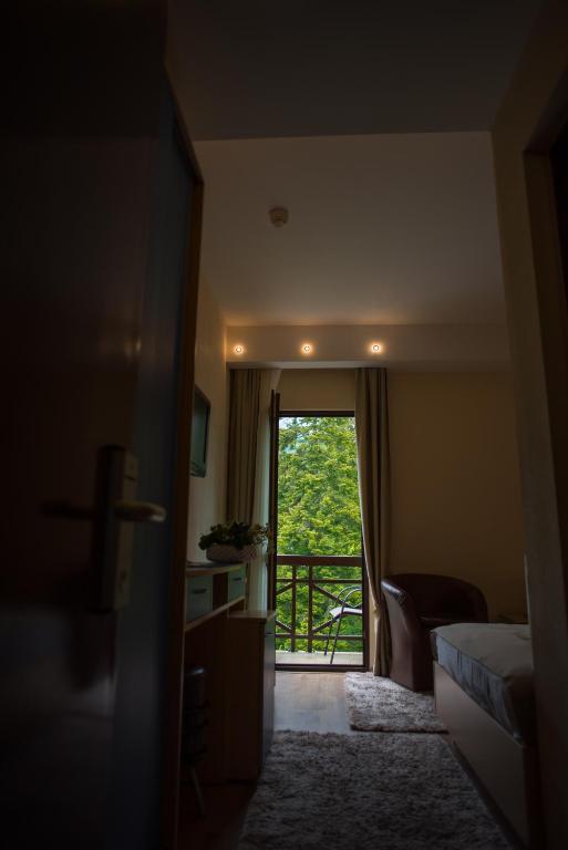 Postel nebo postele na pokoji v ubytování Hotel Marami