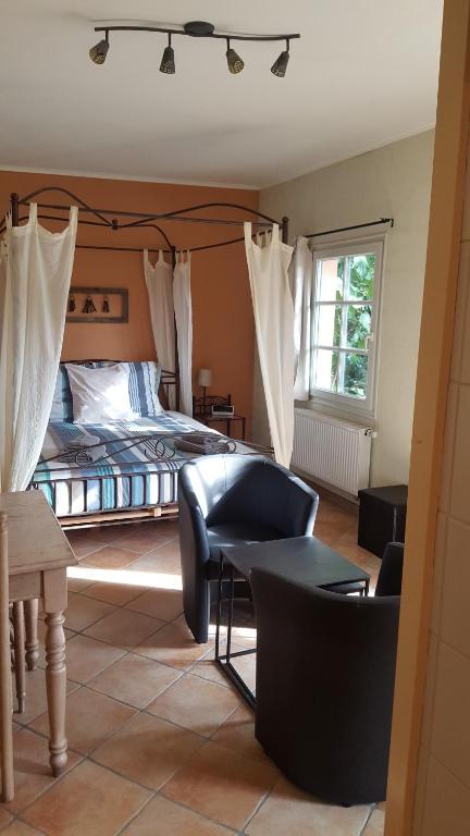 Postel nebo postele na pokoji v ubytování B&B La Clé du Sud