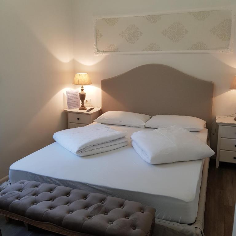 Posteľ alebo postele v izbe v ubytovaní Garni Villa Tyrol - Adults Only