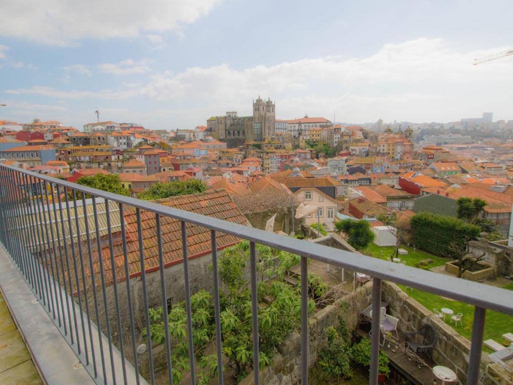 a view of a city from a balcony at ALIBI by YoursPorto in Porto