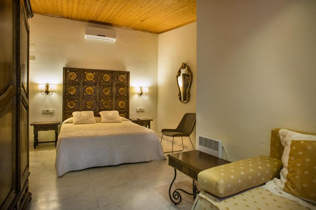 Postel nebo postele na pokoji v ubytování Hotel El Molí