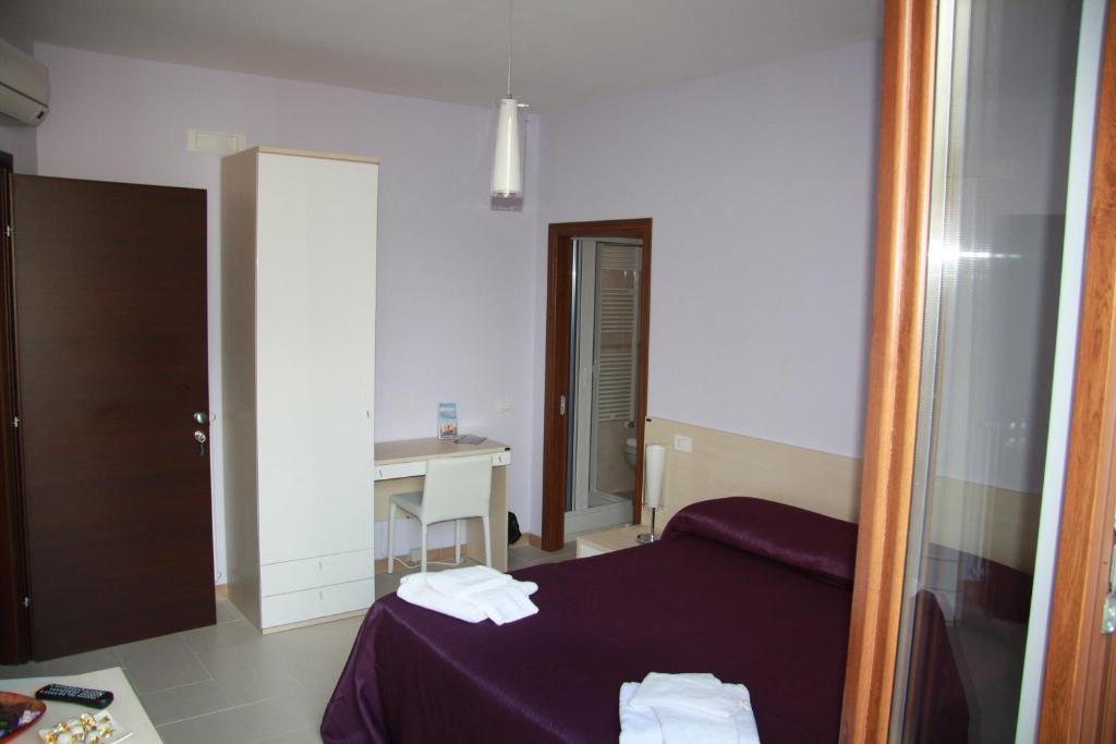 Postel nebo postele na pokoji v ubytování B&B Angolo Felice