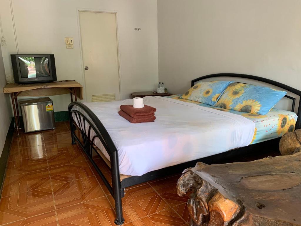 Postel nebo postele na pokoji v ubytování Sam's House Kanchanaburi
