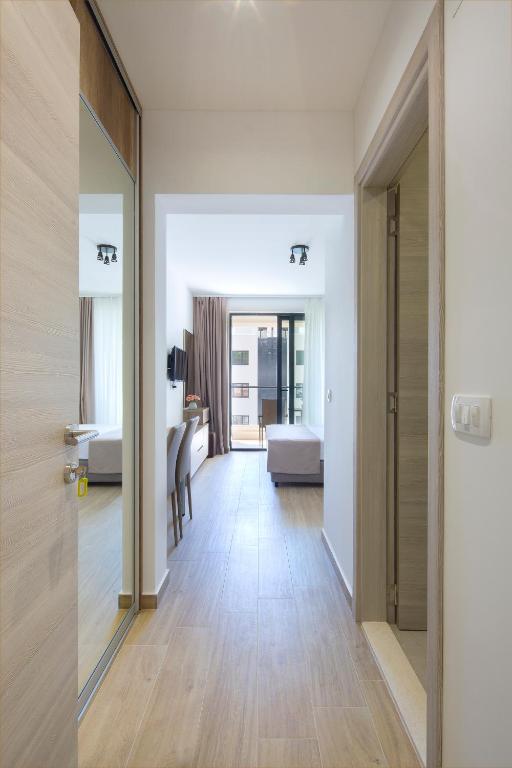 Postel nebo postele na pokoji v ubytování Apartments Djuro Rafailovic