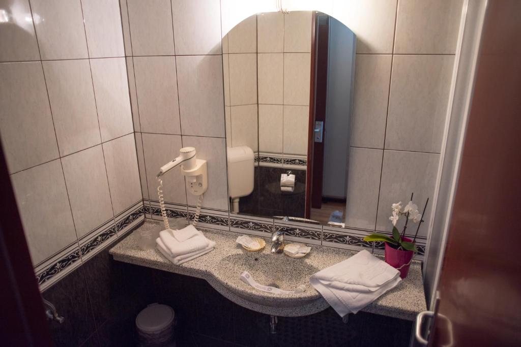 Koupelna v ubytování Hotel Marami
