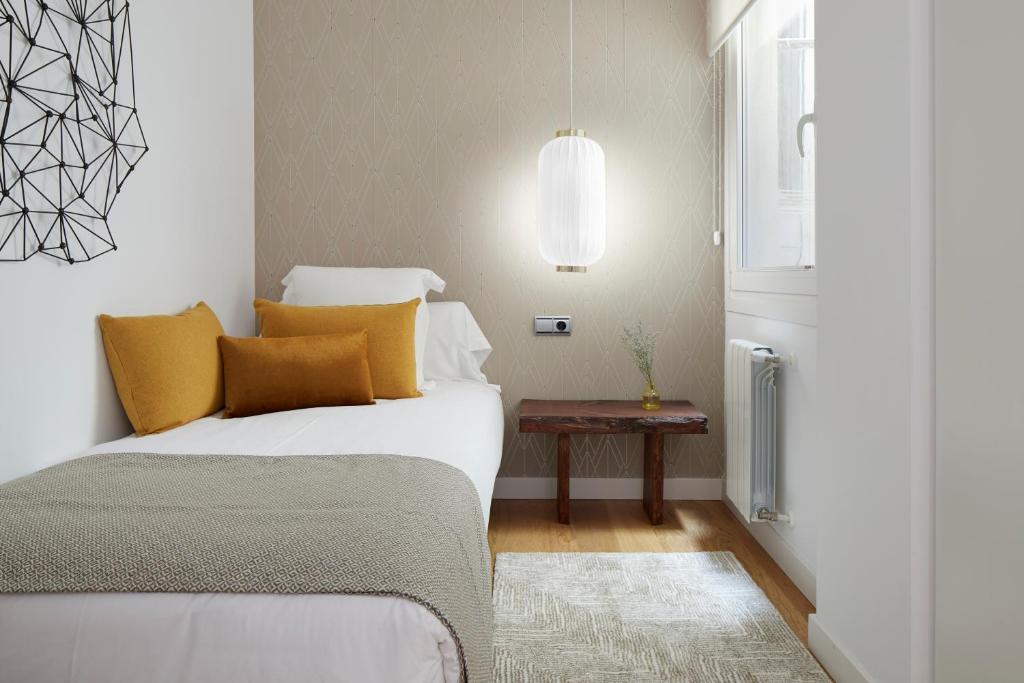 Postel nebo postele na pokoji v ubytování Salamanka by FeelFree Rentals
