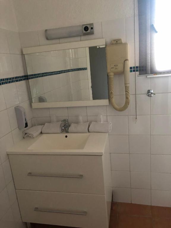 Koupelna v ubytování Hotel Aurelia