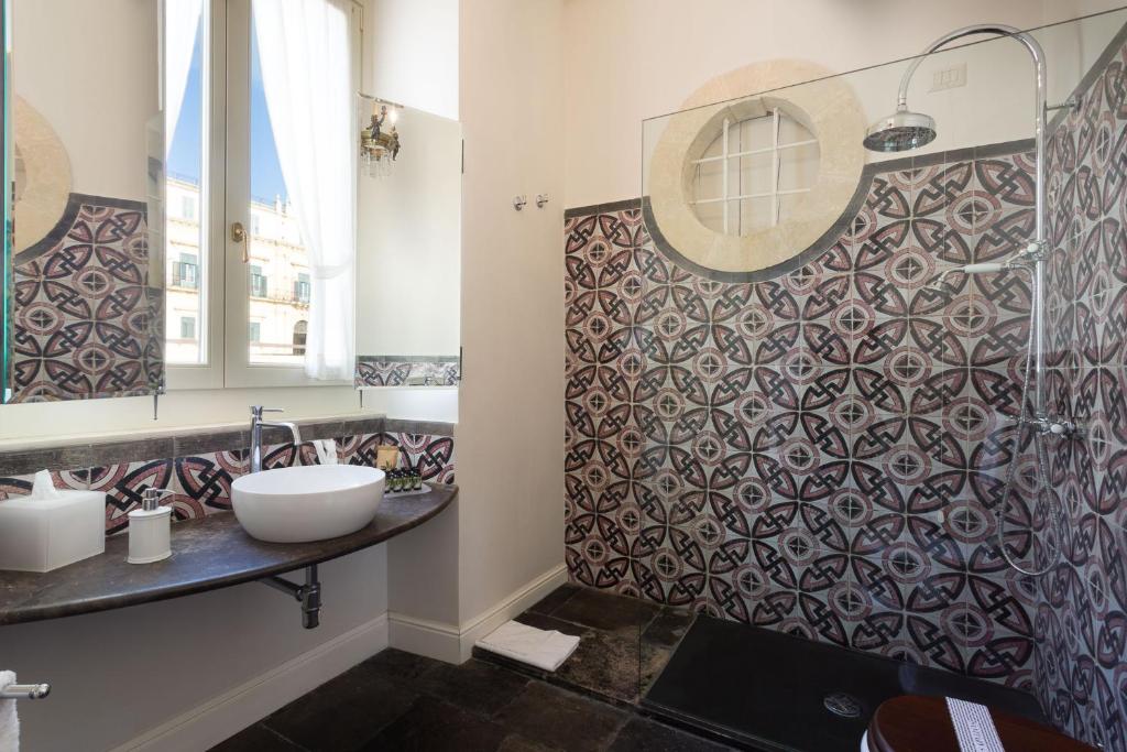 Koupelna v ubytování San Carlo Suites