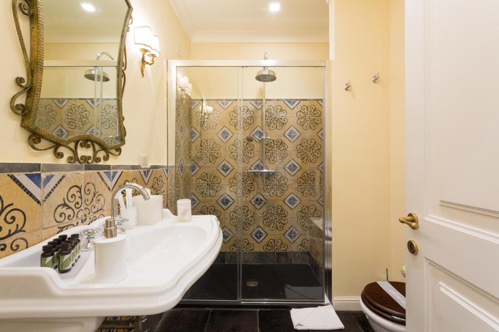 Koupelna v ubytování San Carlo Suites