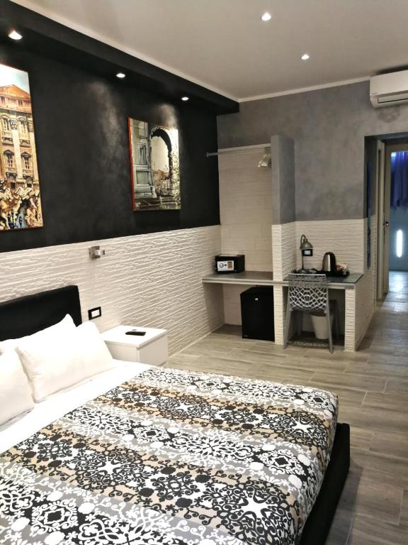 Postel nebo postele na pokoji v ubytování Excellence Suite