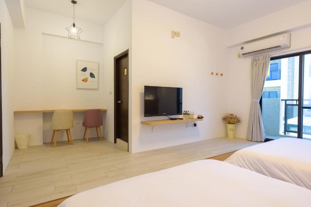 Postel nebo postele na pokoji v ubytování Sunny day B&B