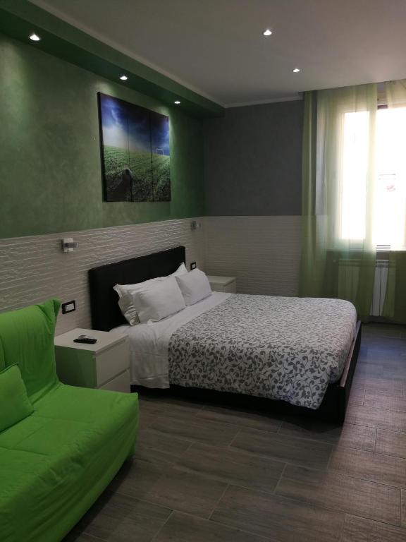 Postel nebo postele na pokoji v ubytování Excellence Suite