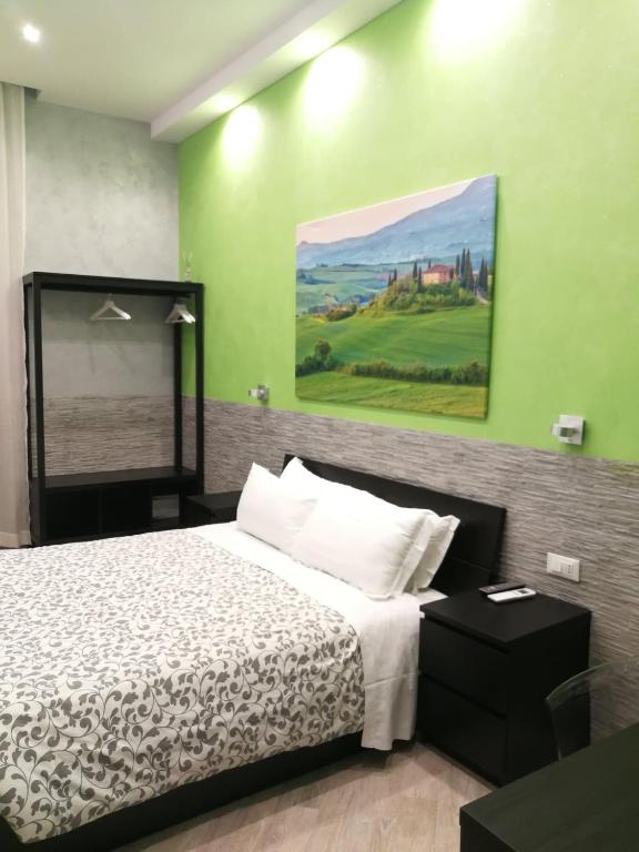 Postel nebo postele na pokoji v ubytování Excellence Suite