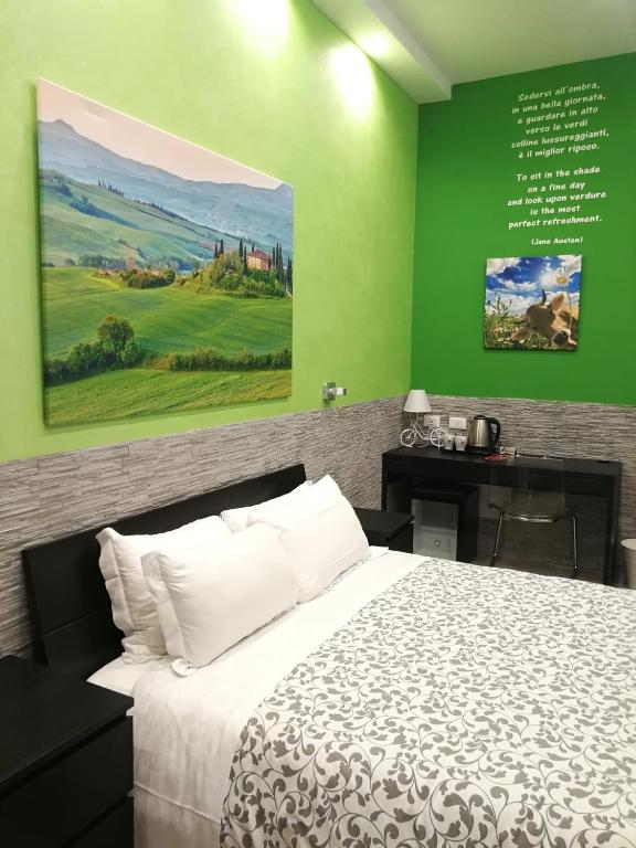 Postel nebo postele na pokoji v ubytování Excellence Suite