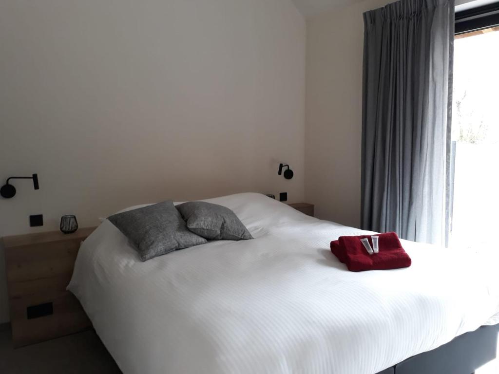 Postel nebo postele na pokoji v ubytování B&B Snelleghem