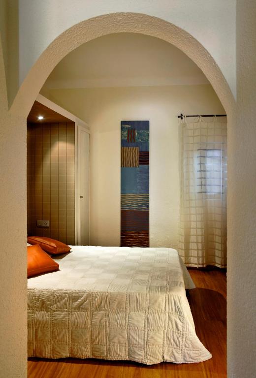 Postel nebo postele na pokoji v ubytování Hotel El Molí
