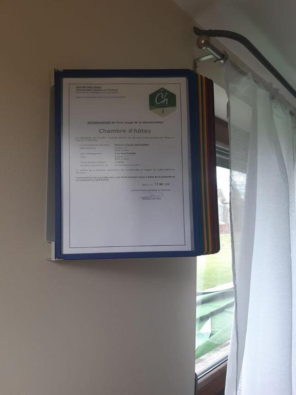 Een certificaat, prijs of ander document dat getoond wordt bij A La Reid Paisible
