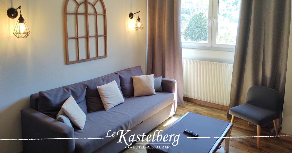 Posezení v ubytování Hôtel Restaurant Le Kastelberg, The Originals Boutique