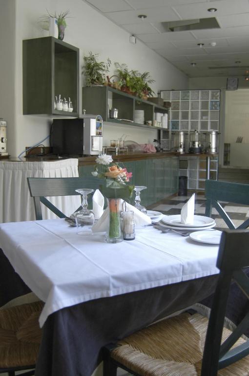 Kuchyň nebo kuchyňský kout v ubytování Ilis Hotel