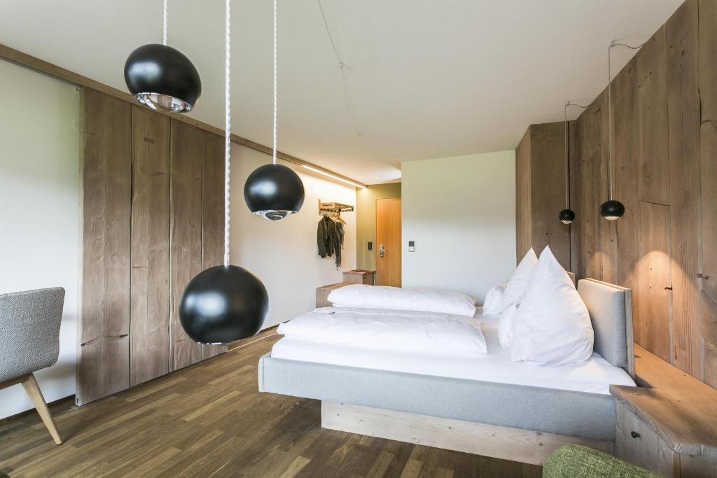 Postel nebo postele na pokoji v ubytování Hotel Sonne Garni