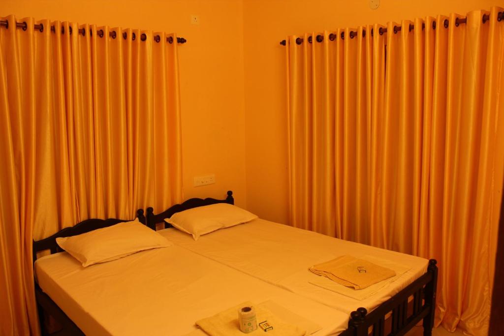 Postel nebo postele na pokoji v ubytování Bastian Homestay