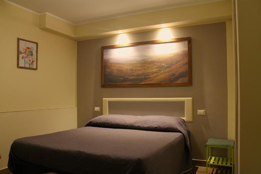 Posteľ alebo postele v izbe v ubytovaní Alter Ego b&b Assisi