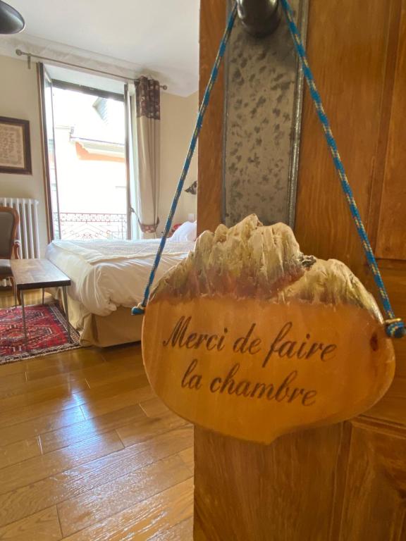Postel nebo postele na pokoji v ubytování Hôtel du Lion d'Or