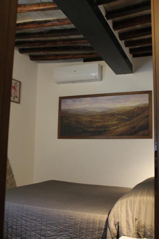 Posteľ alebo postele v izbe v ubytovaní Alter Ego b&b Assisi