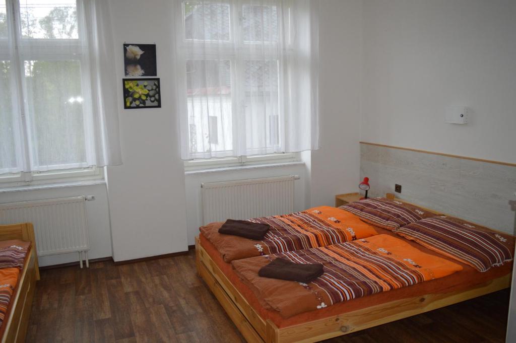 Postel nebo postele na pokoji v ubytování Chata Nová Seninka