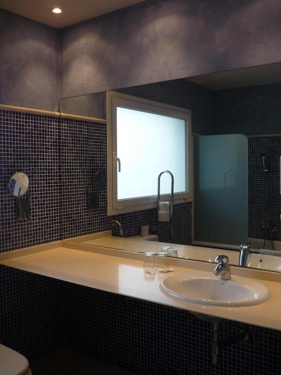 Kúpeľňa v ubytovaní Hotel Haromar