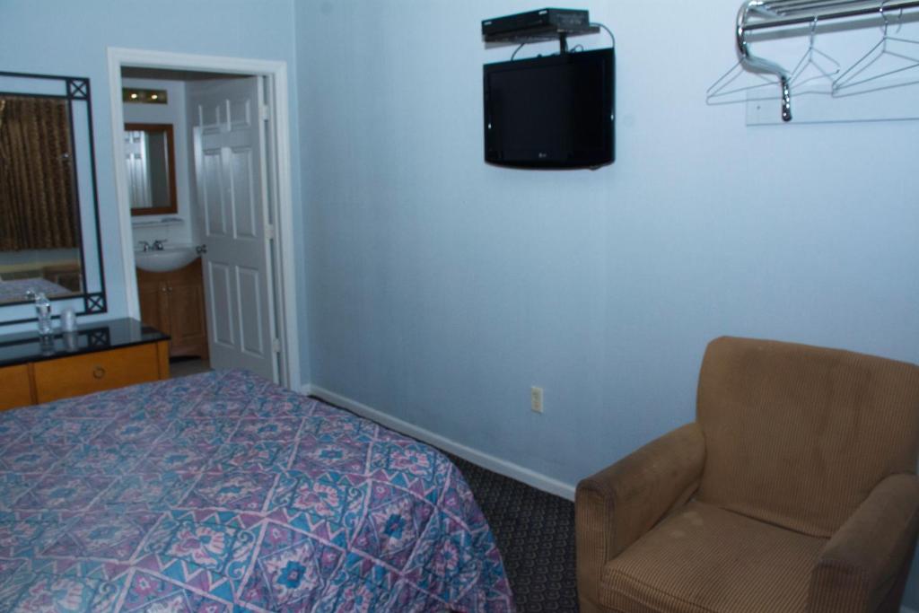 TV a/nebo společenská místnost v ubytování At 9 Motel