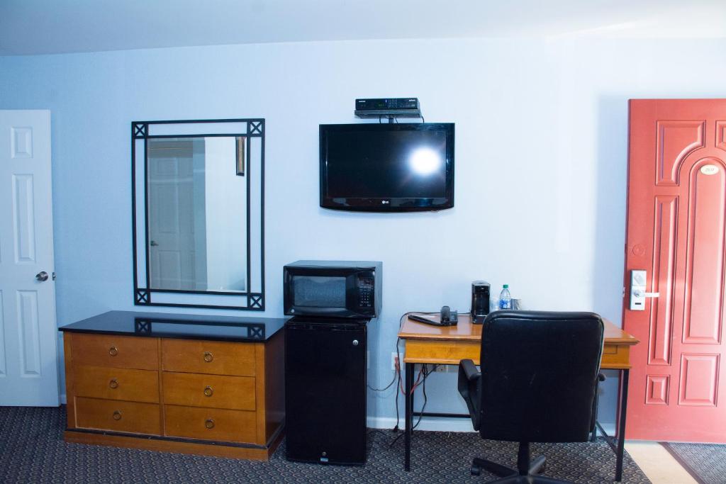 TV a/nebo společenská místnost v ubytování At 9 Motel