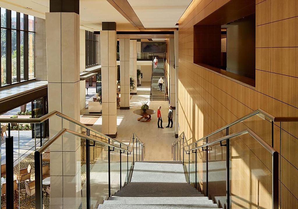 a view of a building with people walking down the stairs at Luskin Hotel in Los Angeles