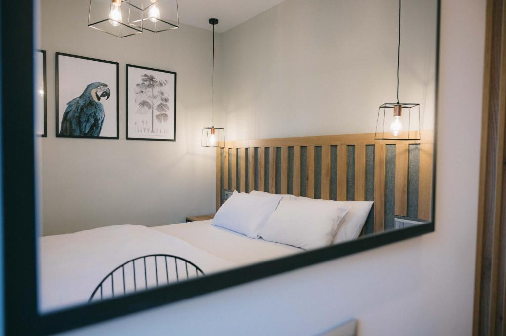Postel nebo postele na pokoji v ubytování Hotel Hermes Pieria