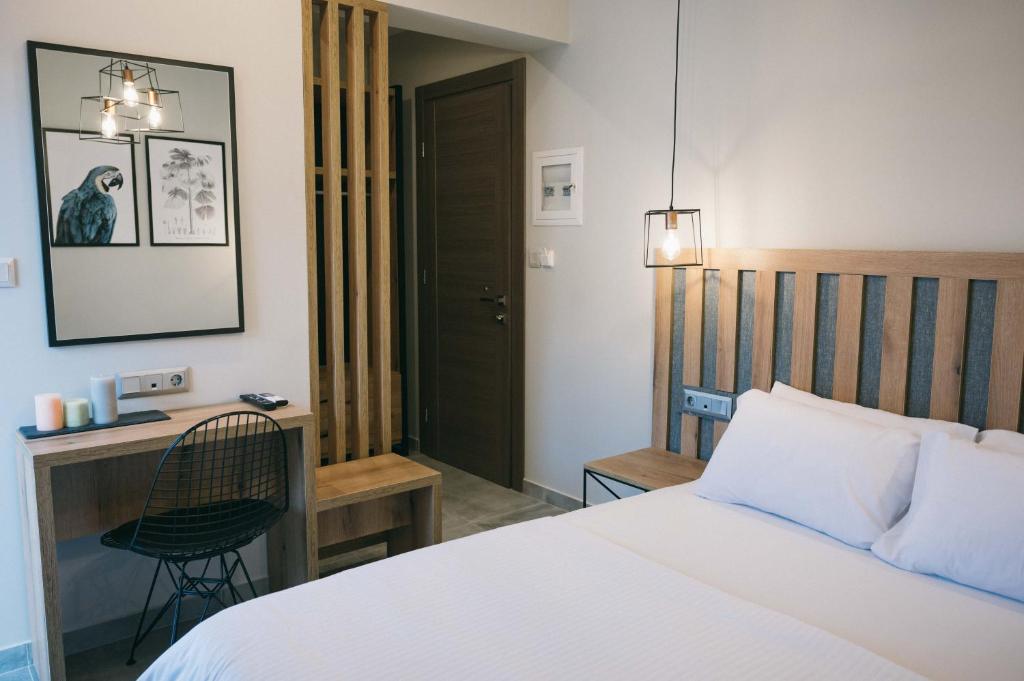 Postel nebo postele na pokoji v ubytování Hotel Hermes Pieria