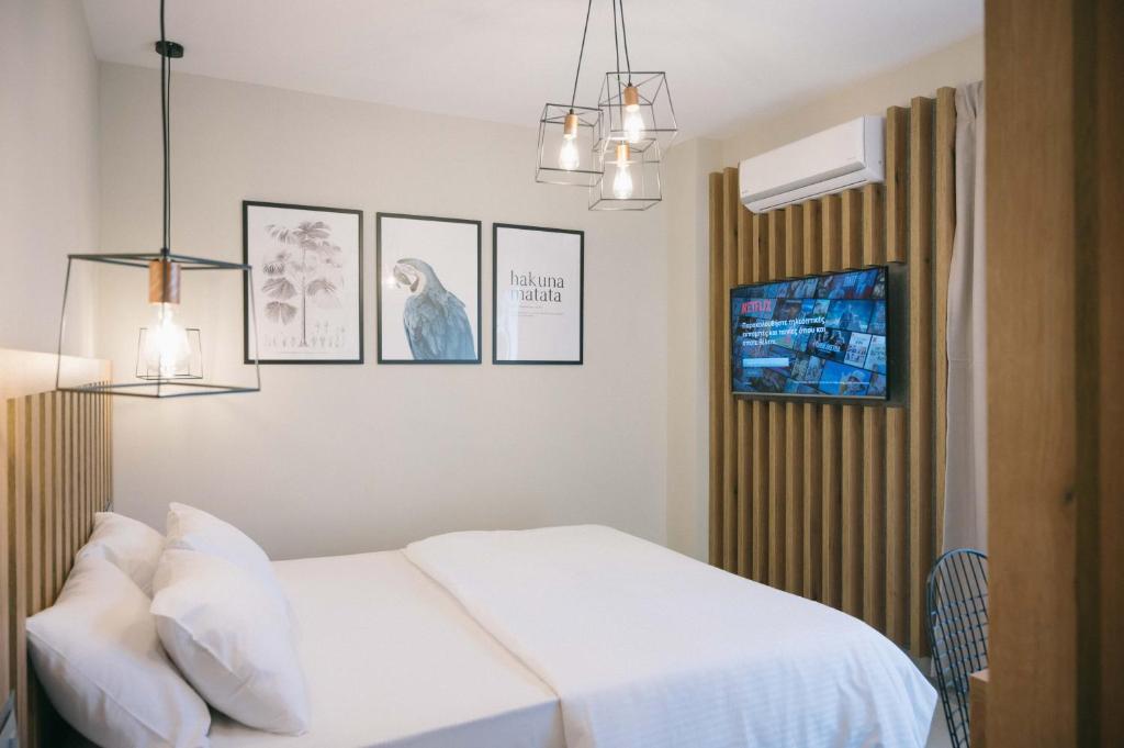 Postel nebo postele na pokoji v ubytování Hotel Hermes Pieria