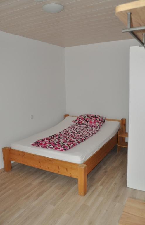 Postel nebo postele na pokoji v ubytování Mostheuriger Steyrdurchbruchalm