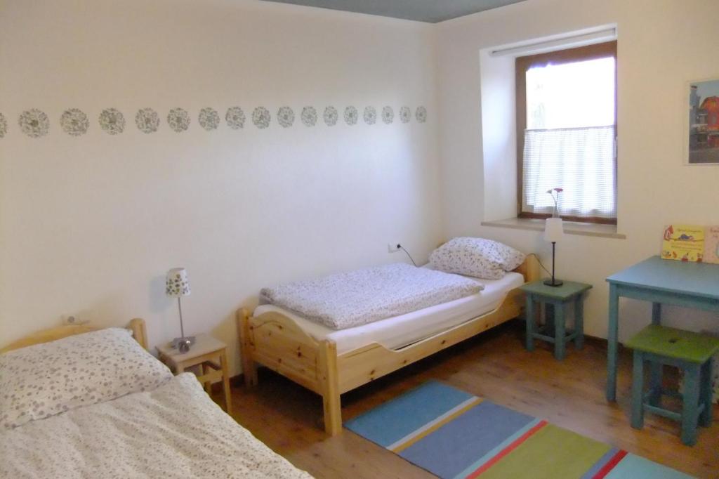 Postel nebo postele na pokoji v ubytování Zehentmayrhof