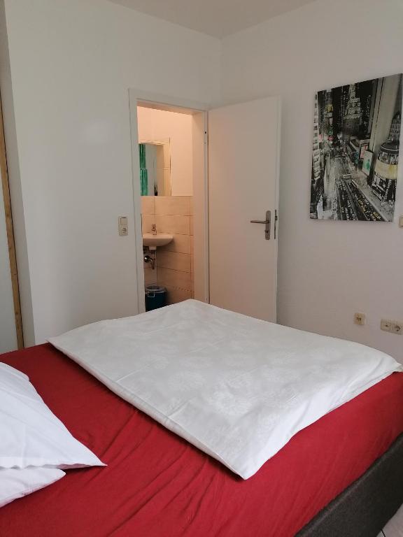 Postel nebo postele na pokoji v ubytování FEWO-ATLANTA Reinhardshausen