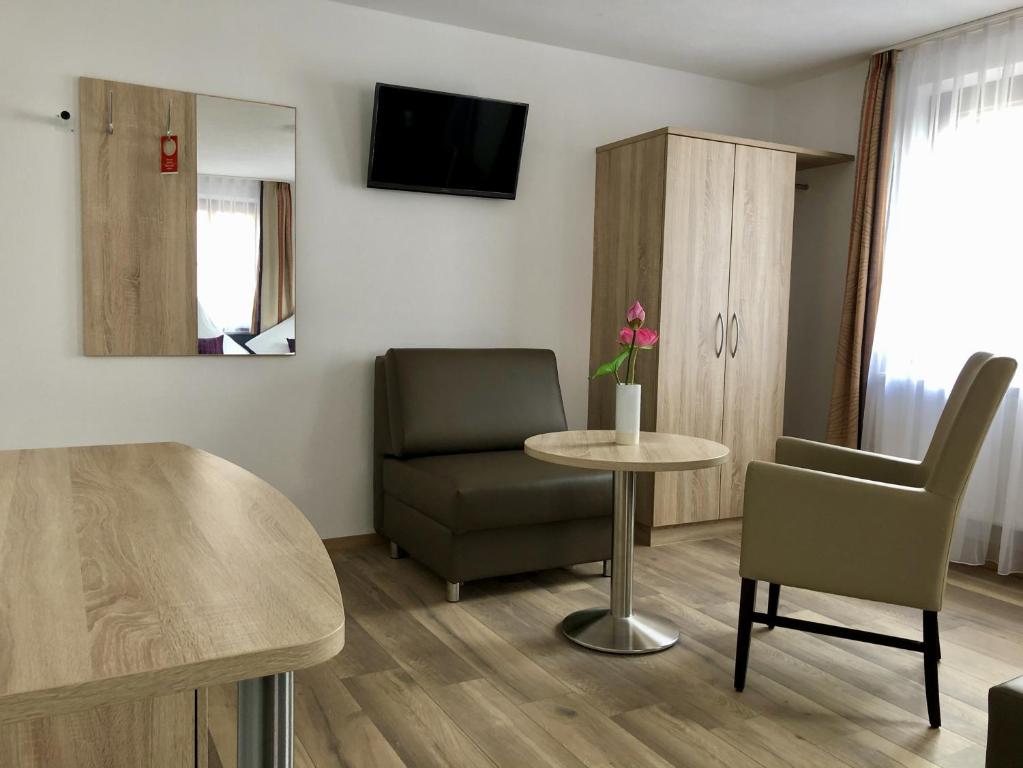 TV a/nebo společenská místnost v ubytování A Lotus Hotel