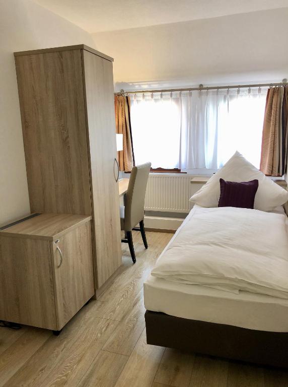 Postel nebo postele na pokoji v ubytování A Lotus Hotel