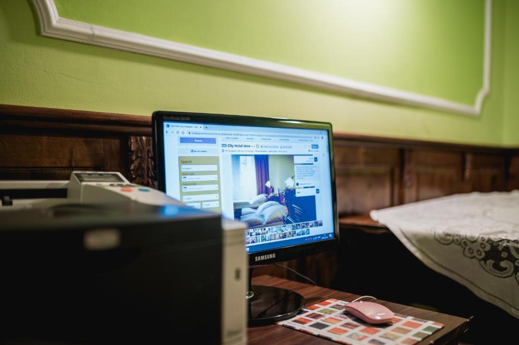 Postel nebo postele na pokoji v ubytování City Hotel UNIO superior