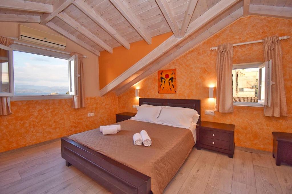 Posteľ alebo postele v izbe v ubytovaní Elpida's House