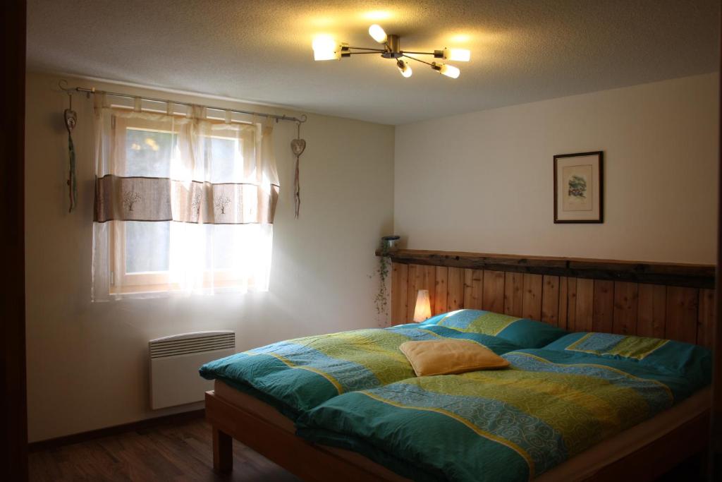 Postel nebo postele na pokoji v ubytování Chalet Samson