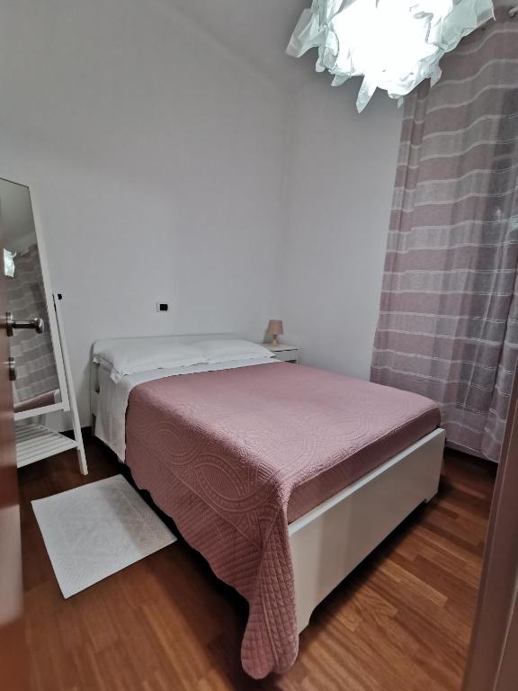 Postel nebo postele na pokoji v ubytování Affittacamere e appartamenti - Rent rooms and Apartments Le Camere Nel Corso - ADULTS ONLY