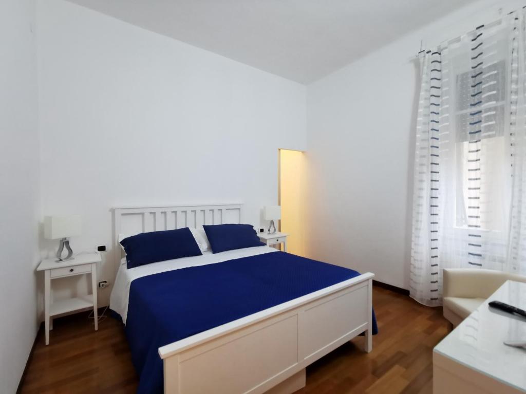 Postel nebo postele na pokoji v ubytování Affittacamere e appartamenti - Rent rooms and Apartments Le Camere Nel Corso - ADULTS ONLY