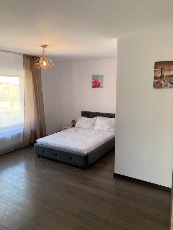 Postel nebo postele na pokoji v ubytování InnTime