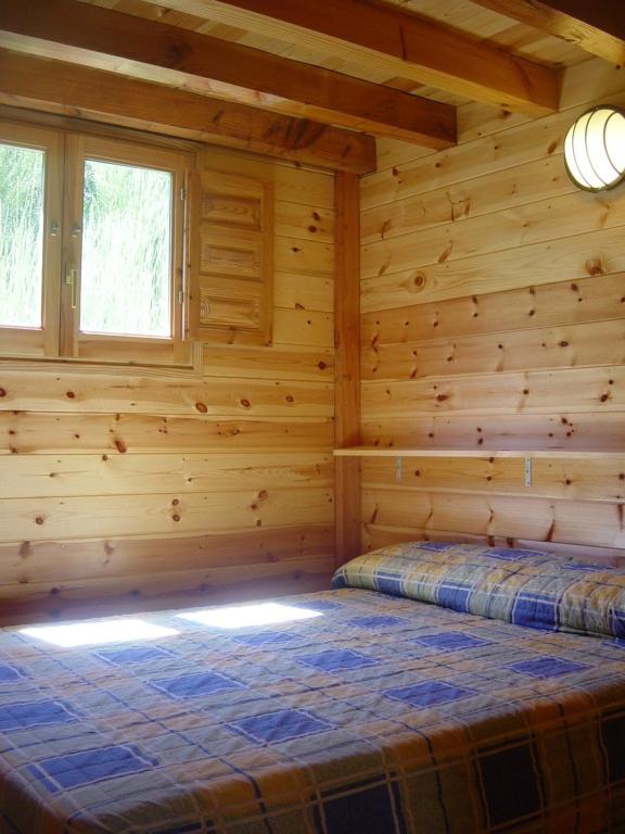 Postel nebo postele na pokoji v ubytování Camping Vall de Ribes