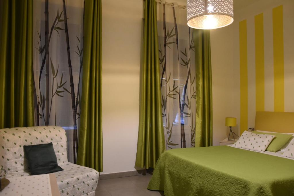 Postel nebo postele na pokoji v ubytování Affittacamere e appartamenti - Rent rooms and Apartments Le Camere Nel Corso - ADULTS ONLY