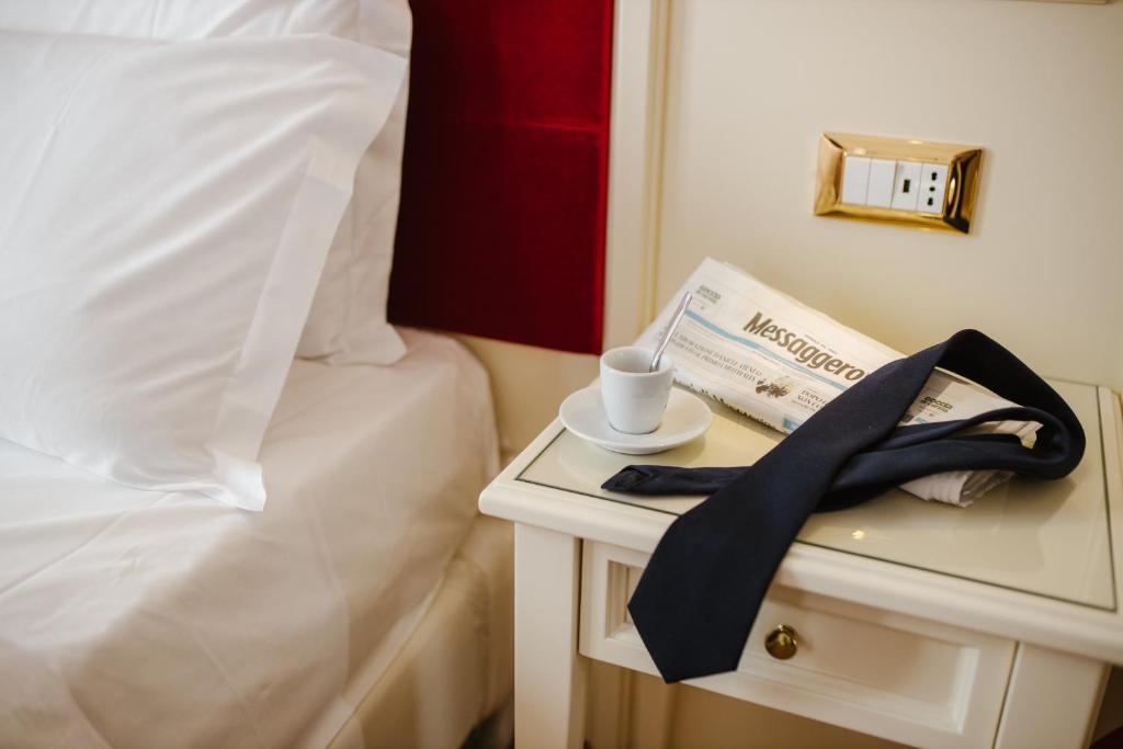 Postel nebo postele na pokoji v ubytování Hotel Città di Parenzo